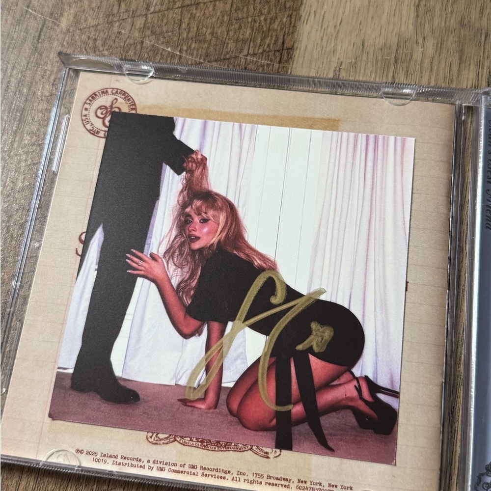 Sabrina Carpenter Signed CD - Man’s Best Friend
